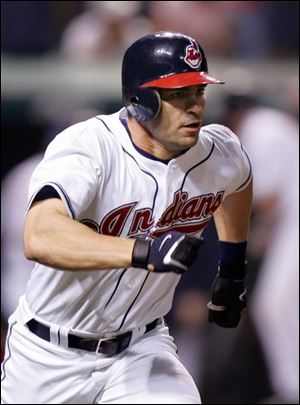 The Indians  David Delucci heads to first with his game-winning single in the ninth.
