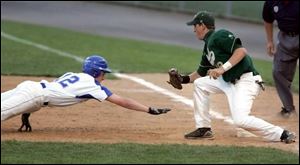 Elmwood s Tyler Chamberlain is picked off first as Ursuline s Mark Lapikas applies the tag.
