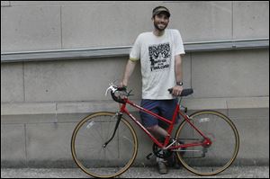 Bicycling is among modes of transportation Andy Stepnick uses when he s not driving a Toyota Prius.