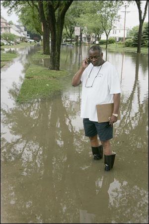 Councilman Michael Ashford, calls on residents in the Franklin Avenue area to check on their needs. 