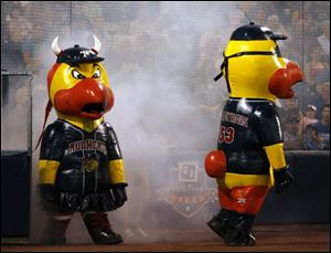 New Mud Hens mascots Muddiva, left, and Muddevious make their debut at Fifth Third Field.