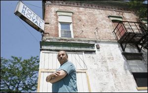 Sarkis David, who owns a sub shop and deli across the street from the Hotel Royal, is a supporter of the hostel project. 