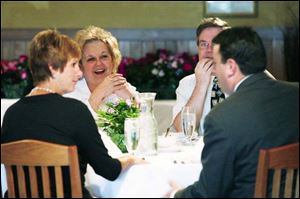 Among those honored or representing the current administration were, from left, Darlene Lohmeyer, guidance counselor at McCord Junior High; Anna Nash-Friedman, English teacher at McCord; Gregory Leugers, science teacher at McCord, and Jim Nusbaum, school board member.
