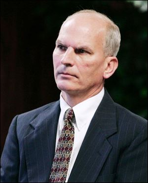 Randy Krell, a former member of the Bedford school board faces charges in the crash that killed one teen and injured another in 2006.