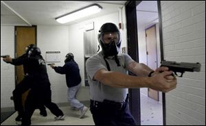 The patrol s special response team was training area police yesterday at Bowling Green State University in tactics that could be useful in a Virginia Tech-type situation.