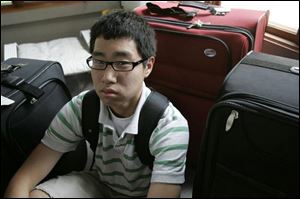Andrew Jung, 17, will be flying out of Toledo tomorrow and will spend the next year with his parents in South Korea.