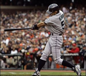 The Mariners' Ichiro Suzuki connects on an inside-the-park home run.