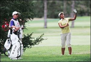 Se Ri Pak tries to envision a shot yesterday at Highland Meadows in the first round of the Jamie Farr Owens Corning Classic. The four-time champion can certainly see herself with another trophy after opening with a 63 and having been in the 60s in 25 of 39 rounds at the Meadows. She takes a two-shot lead into the second round today.