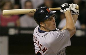 Tigers first baseman Mike Hessman, who was called up from the Mud Hens yesterday, hits a two-run single in the seventh inning to score Magglio Ordonez and Carlos Guillen.