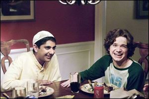 Adhir Kalyan, left, as Raja, and Dan Byrd as Justin in Aliens In America.