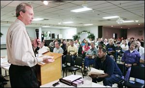 Keith Obey, head of an employee ownership investment plan, explains his proposal for the Maumee stamping factory.
