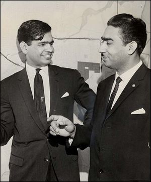 In 1963, Dr. Hussain, at left, chatted with Syed Yusaf Ali Shaw, the mayor of Peshawar, West Pakistan.