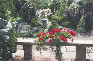 Merle Peoples and Jonathan Parsons  yard won first place in the community garden category.