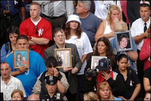 A crowd gathers in Zuccotti Park in lower Manhattan to commemorate the sixth anniversary of the attacks on the World Trade Center.
