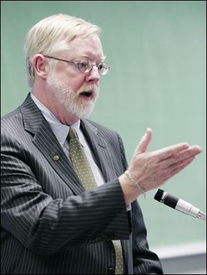 Mark Shanahan, Gov. Ted Strickland's energy adviser, talks about the plan to diversify Ohio's energy sources during a presentation at the University of Toledo's Clean and Alternative Energy Incubation Center. The proposal calls for more of the state's energy to come from advanced technology and seeks to stabilize electric rates after utility agreements expire at the end of next year.