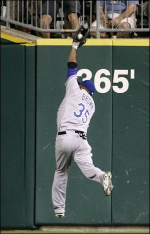 Royals  Emil Brown makes a catch of a Brandon Inge fly
ball in the fourth inning.