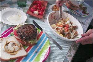 The Gerkens' menu for the challenge's last day included food from their garden and ears of corn, as well as hamburgers.