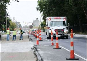 Cherry Street will be open through the Central intersection but lane closings will continue as the $6 million reconstruction project proceeds through its final stages.