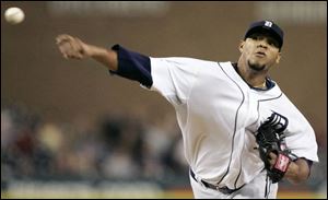 The Tigers' Yorman Bazardo made his second major league start last night. He pitched seven scoreless 
innings, giving up six hits and walking three as Detroit handed the Twins their 14th shutout of the season.