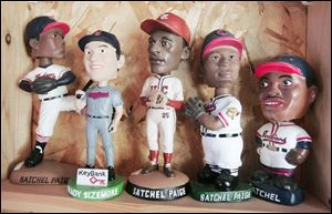 A few of the Cleveland Indians bobble head dolls in the collection.
