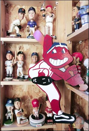  A few of the bobble head dolls, and an old Chief Wahoo cutout.