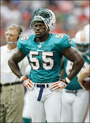 Miami s Joey Porter, right, says just what he feels  usually all bad about Winslow. 
