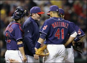 Indians manager Eric Wedge goes to the mound to remove
Paul Byrd during Game 4 of the ALCS at Jacobs Field.
