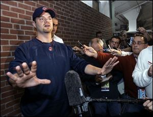 Paul Byrd addresses the media before last night's American League championship series Game 7 at Fenway Park.