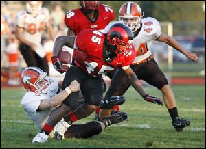 Rogers senior Isaiah Ballard has rushed for 921 yards on 128 carries. He leads the City League with 19 touchdowns.