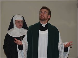 Sister Aloysius (Kimberly Yost) is suspicious of the behavior of Father Brenden Flynn (Kurt Kutchenriter) in Doubt, A Parable.