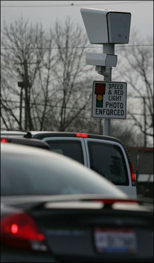 Toledo has 30 traffic-signal cameras. City council is reviewing a proposal that would increase fines from the current $95 to $120 and increase the city's share of fines from 25 percent to 54 percent. In addition, 12 new cameras would be installed around the city.