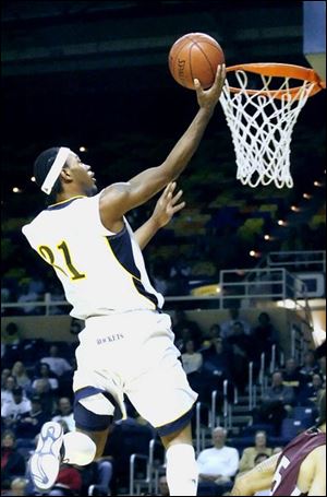 The University of Toledo's Tyrone Kent makes sure on this 
layup. He leads the Rockets in scoring with a 20.5 ppg average.