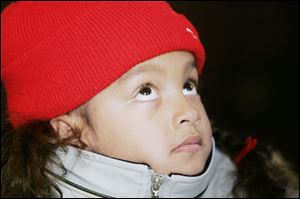 Janaya Harris seems enthralled by the surroundings and is wide-eyed as she pays close attention to the guide.