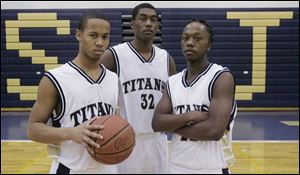 St. John's has experience with, from left, Michael Taylor, Tim Simmons and Jay Springs. The
Titans lost the City League final to Libbey last year but defeated the Cowboys in the district.