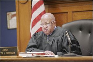 Lucas County Common Pleas Judge Charles J. Doneghy presided over the murder trial and sentenced Robert Jobe.
