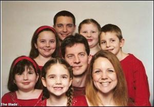 
A family photo shows (clockwise from bottom left), Sidney Griffin, Haley Burkman, Brett Burkman (not in vehicle), Jordan Griffin, Beau Burkman, Bethany Griffin and Lacie Burkman. At center is Danny Griffin, Jr., Haley, Jordan, Bethany, Lacie and Vadie (not pictured) were killed in the crash.

