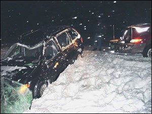 Students were returning from Chicago when the van careened off the road. Five others were treated for injuries. 