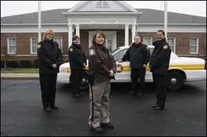 Sarah Toth, foreground, is in charge of helpers such as, from left, Kelly Spychalski, Diane Hieber, Paul Hamel and Lana Sweeney.