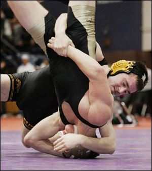 Waite's Scott Fuller puts Kyle Ciccarello of Lyndhurst Brush on his head in the 119-pound final at the Kerr Memorial at Waite. Fuller won 5-2 and was named most valuable wrestler. 