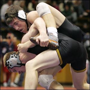 Southview's Alex Latham, top, controls Waite's Jacob Wilson in the 130-pound division final. Latham won 8-1. 