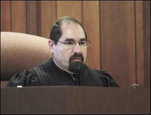 Judge Joseph Costello Jr. of Monroe County Circuit Court said Charles Fackelman will remain in jail until sentencing Feb. 22.