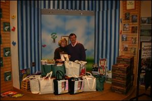 Julie and Brad Rubini at a Claire s Day reception recently at Barnes & Noble Booksellers.