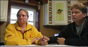 Tricia and William Dold say she has progressed from a wheelchair to a cane since her surgery but still needs painkillers. 