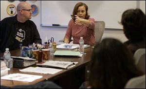 <i>CSI: NY</i> executive producers Pam Veasey and producer Trey Callaway lead the staff in a brainstorming session for new episodes.