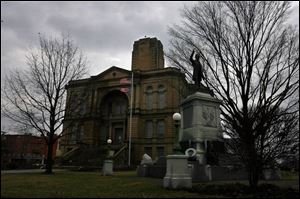 Clouds loom over the Seneca County Courthouse during the last tours before the bond vote.