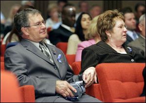 Mike and Larraine Dressel, parents of Detective Keith Dressel, listen as their late son is honored during the Toledo Police Department s annual awards ceremony in May, 2007. They say their son won t be forgotten because he helped so many people.
