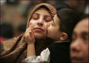 Enas Jaafar and her son, Mustapha Chouaib, 4, mark the occasion.