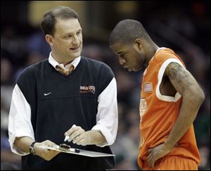 Dan Dakich, talking to BGSU's Brian Moten last season, takes over as interim coach at Indiana University. He compiled a 156-140 record in 10 seasons at Bowling Green.