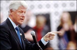 Former President Bill Clinton, speaking at Lima Senior High School, tells the audience their votes in next month's Democratic primary are critical to electing Hillary Clinton.