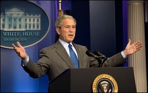 President Bush answers questions from reporters during a news conference at the White House in Washington, Thursday. (ASSOCIATED PRESS)
<br>
<img src=http://www.toledoblade.com/graphics/icons/video.gif> <b><font color=red>AP VIDEO</b></font color=red>: <a href=